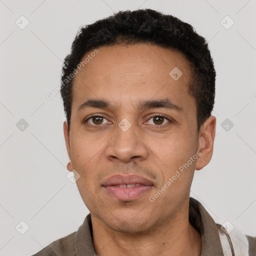 Neutral latino adult male with short  black hair and brown eyes