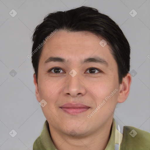 Joyful asian young-adult male with short  brown hair and brown eyes