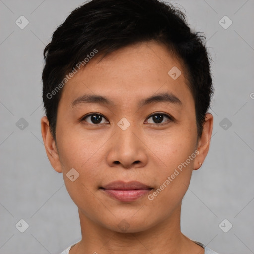 Joyful asian young-adult male with short  brown hair and brown eyes