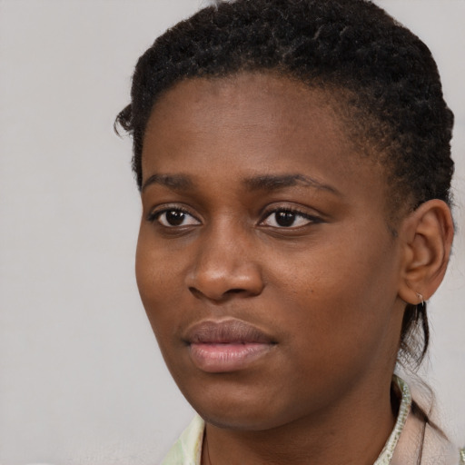 Neutral black young-adult female with short  brown hair and brown eyes