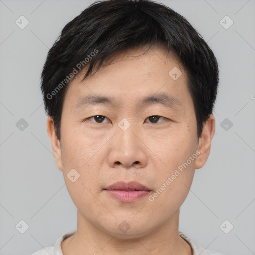 Neutral asian young-adult male with short  black hair and brown eyes