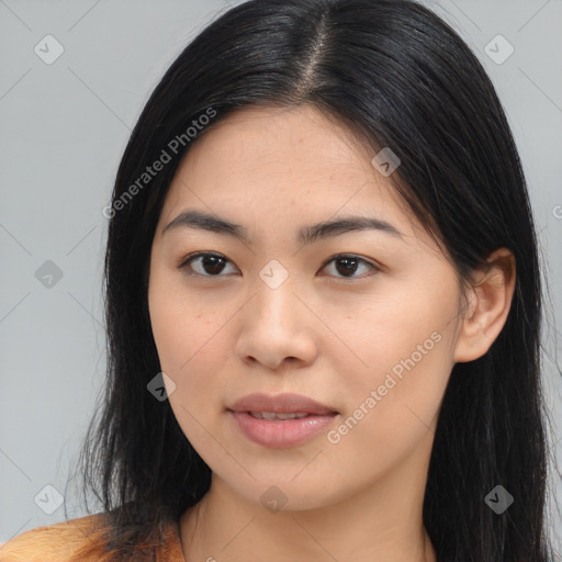 Joyful asian young-adult female with long  black hair and brown eyes