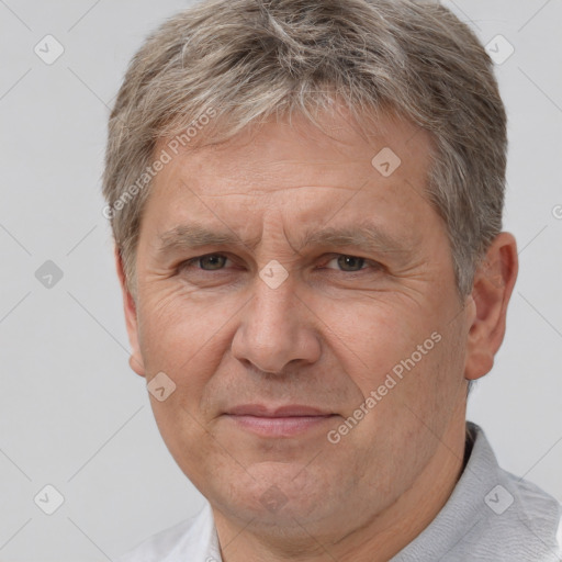 Joyful white middle-aged male with short  brown hair and brown eyes