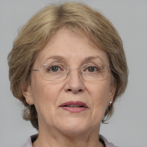 Joyful white middle-aged female with medium  brown hair and brown eyes