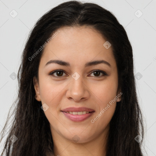 Joyful latino young-adult female with long  brown hair and brown eyes