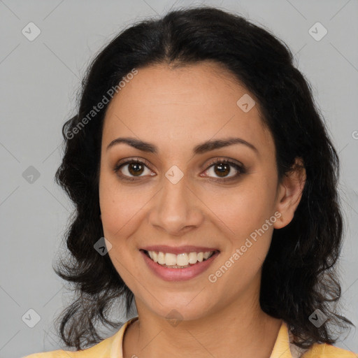 Joyful latino young-adult female with medium  brown hair and brown eyes