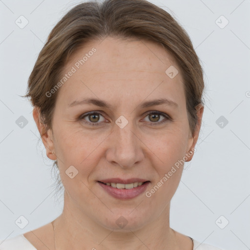 Joyful white adult female with short  brown hair and brown eyes