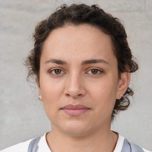 Neutral white young-adult female with short  brown hair and brown eyes