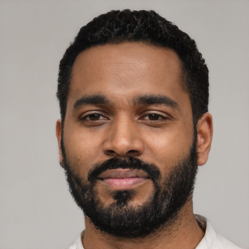 Neutral black young-adult male with short  black hair and brown eyes