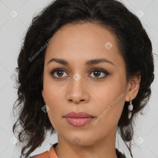 Joyful latino young-adult female with medium  brown hair and brown eyes