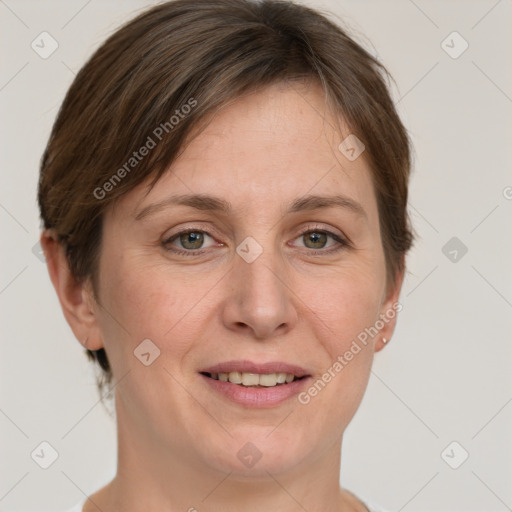 Joyful white adult female with short  brown hair and grey eyes