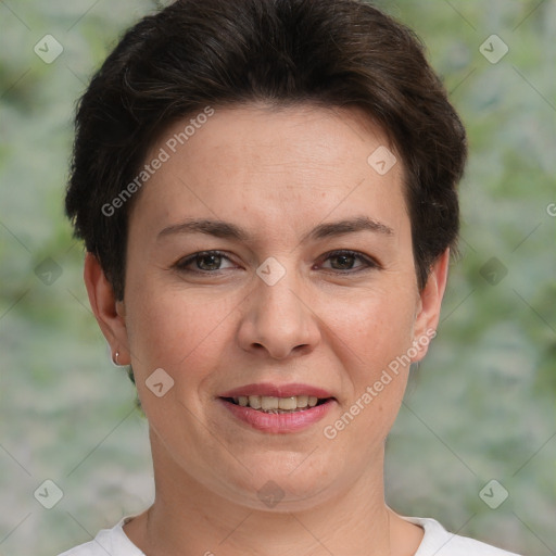 Joyful white adult female with short  brown hair and brown eyes