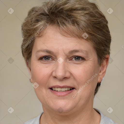 Joyful white adult female with short  brown hair and brown eyes