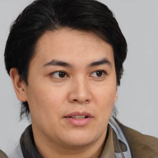 Joyful white young-adult male with medium  brown hair and brown eyes