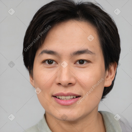 Joyful white adult female with short  brown hair and brown eyes