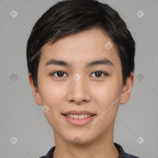 Joyful asian young-adult male with short  black hair and brown eyes