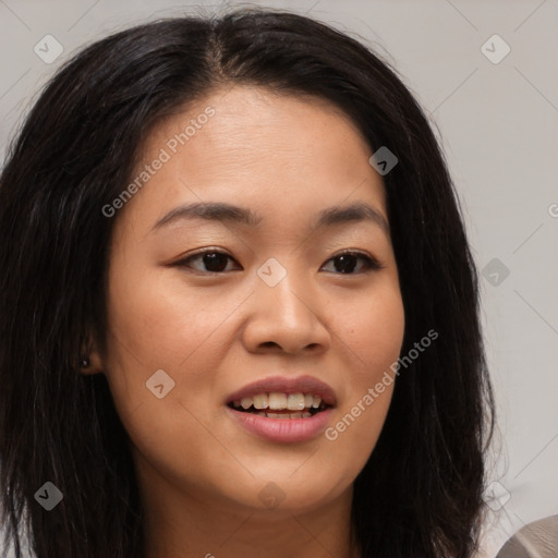 Joyful asian young-adult female with long  brown hair and brown eyes