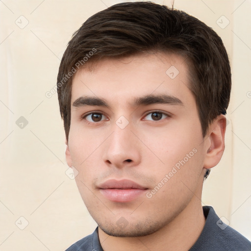 Neutral white young-adult male with short  brown hair and brown eyes