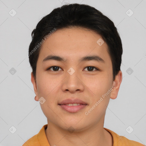 Joyful asian young-adult male with short  black hair and brown eyes