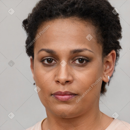 Neutral black young-adult female with short  brown hair and brown eyes