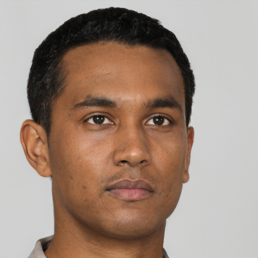 Neutral black young-adult male with short  black hair and brown eyes
