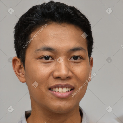 Joyful asian young-adult male with short  black hair and brown eyes