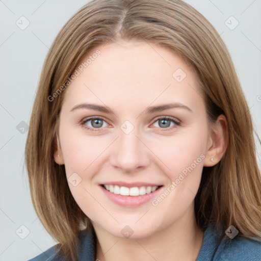 Joyful white young-adult female with medium  brown hair and blue eyes