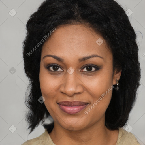 Joyful black adult female with medium  brown hair and brown eyes