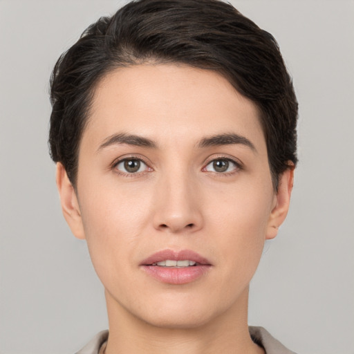 Neutral white young-adult female with short  brown hair and brown eyes