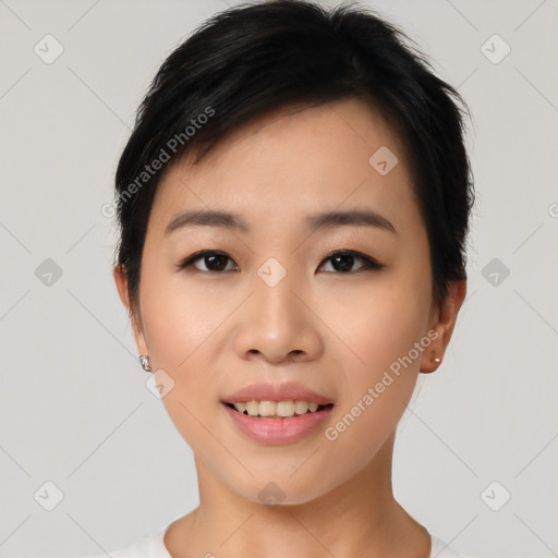 Joyful asian young-adult female with short  black hair and brown eyes