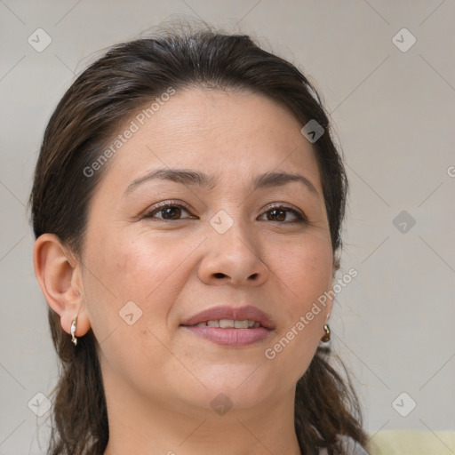 Joyful white adult female with medium  brown hair and brown eyes