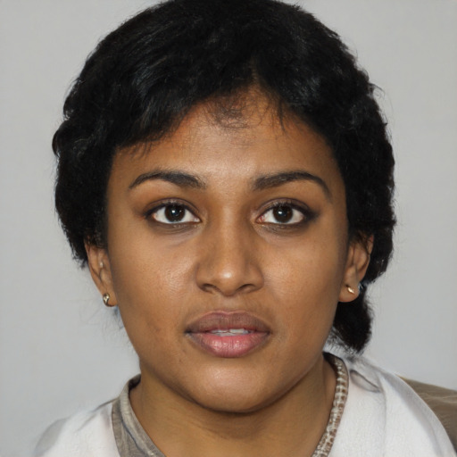 Neutral latino young-adult female with short  black hair and brown eyes