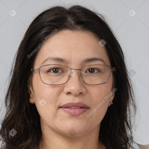 Joyful white adult female with medium  brown hair and brown eyes