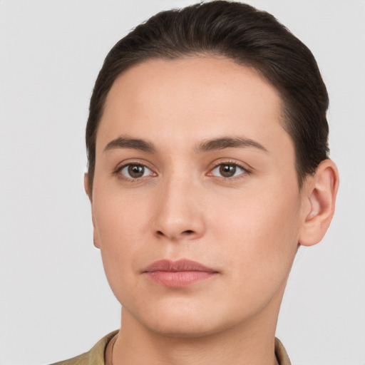 Neutral white young-adult female with short  brown hair and brown eyes