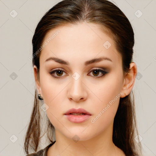 Neutral white young-adult female with long  brown hair and brown eyes