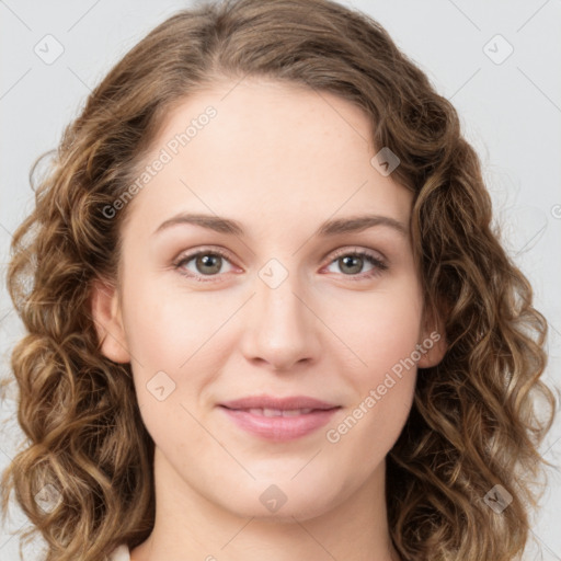 Joyful white young-adult female with long  brown hair and green eyes