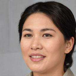 Joyful white young-adult female with medium  brown hair and brown eyes