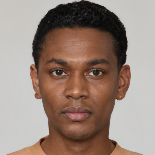 Neutral black young-adult male with short  black hair and brown eyes