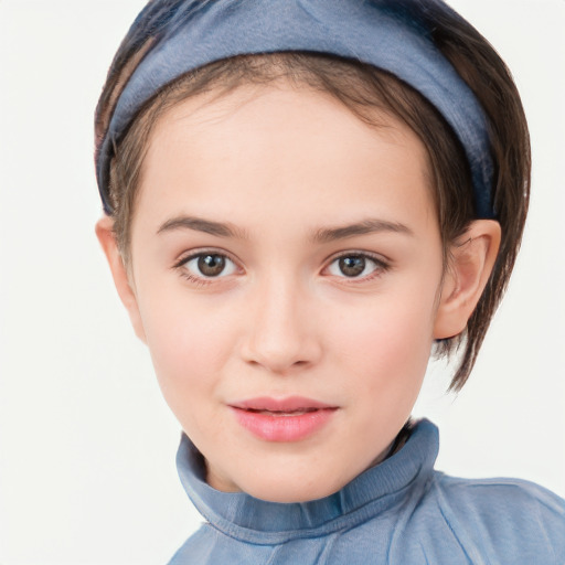 Joyful white child female with short  brown hair and brown eyes