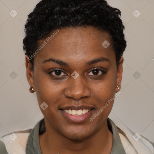 Joyful black young-adult female with short  brown hair and brown eyes