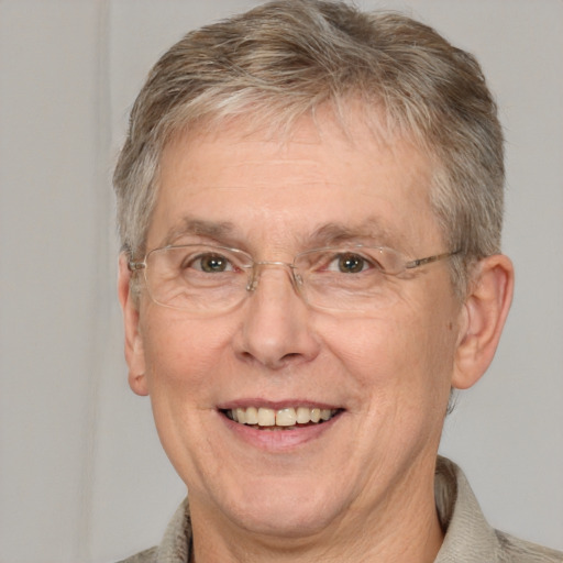 Joyful white middle-aged male with short  brown hair and brown eyes