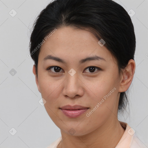 Joyful asian young-adult female with short  brown hair and brown eyes