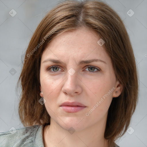 Joyful white young-adult female with medium  brown hair and blue eyes