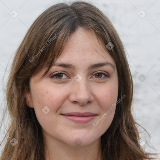 Joyful white young-adult female with long  brown hair and green eyes