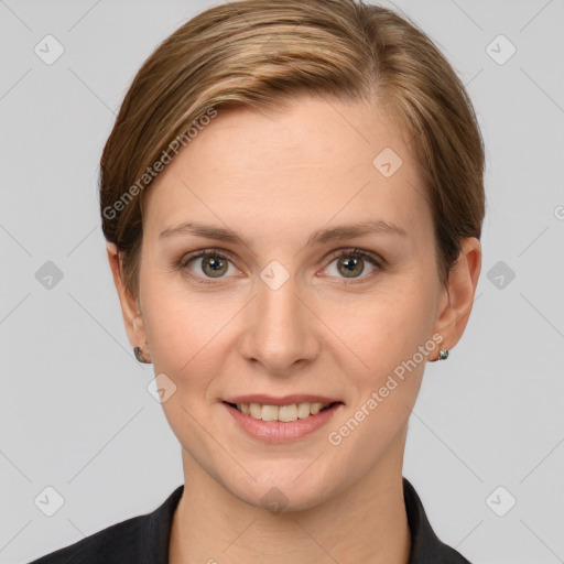 Joyful white young-adult female with short  brown hair and grey eyes