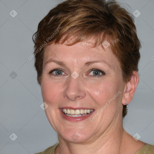 Joyful white adult female with medium  brown hair and blue eyes