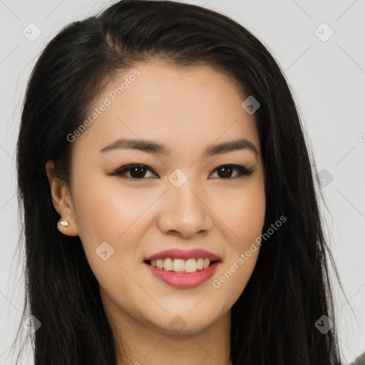 Joyful asian young-adult female with long  brown hair and brown eyes