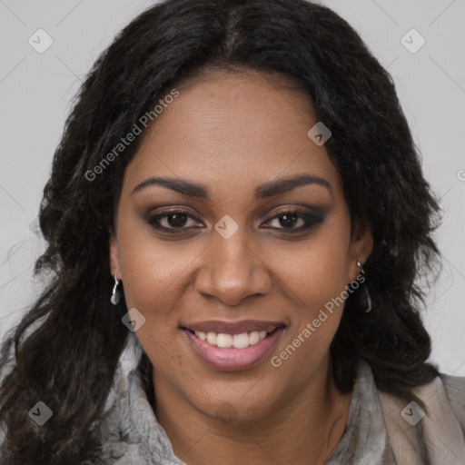 Joyful black young-adult female with long  brown hair and brown eyes