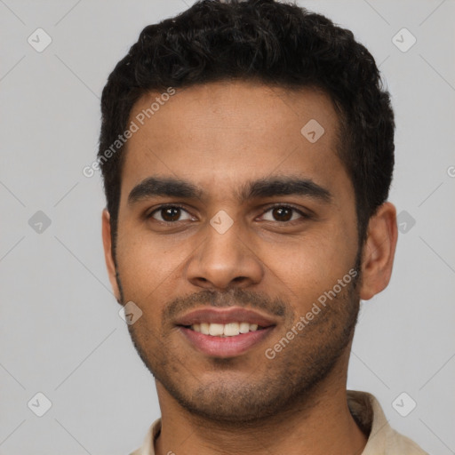 Joyful latino young-adult male with short  brown hair and brown eyes