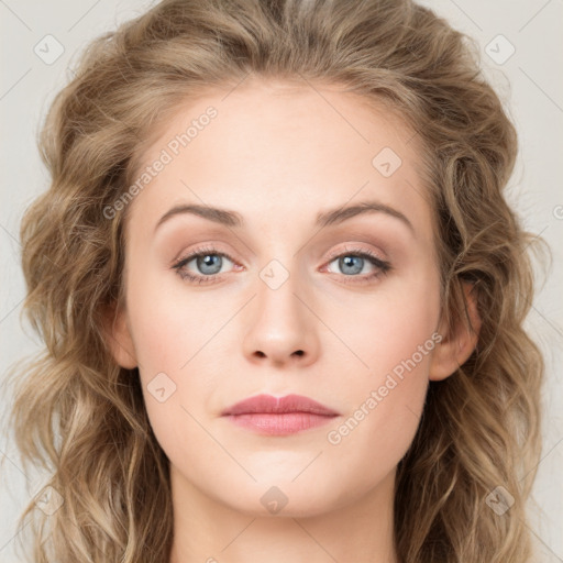 Joyful white young-adult female with long  brown hair and blue eyes